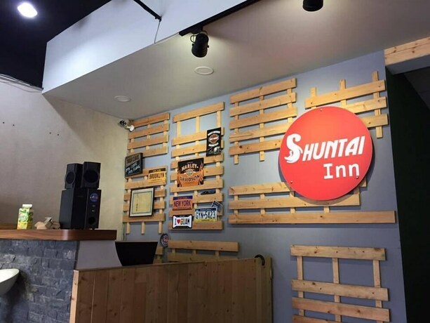Imagen de los interiores del Hotel Shuntai Inn. Foto 38