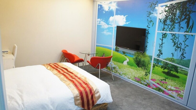 Imagen de la habitación del Hotel Shun-yi. Foto 6