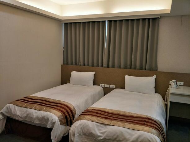 Imagen de la habitación del Hotel Shun-yi. Foto 7