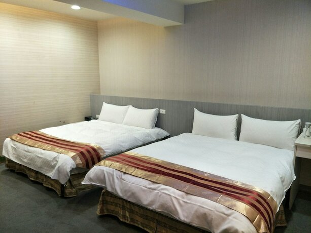 Imagen de la habitación del Hotel Shun-yi. Foto 8