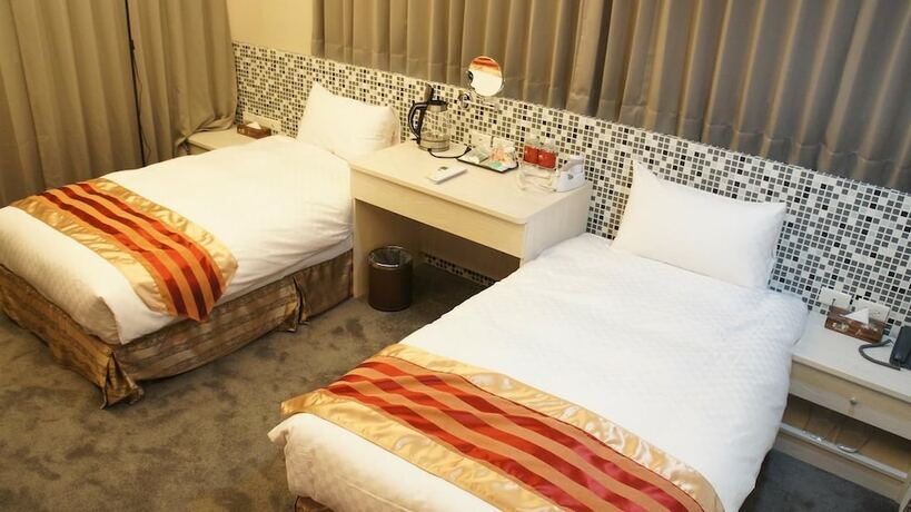 Imagen de la habitación del Hotel Shun-yi. Foto 12