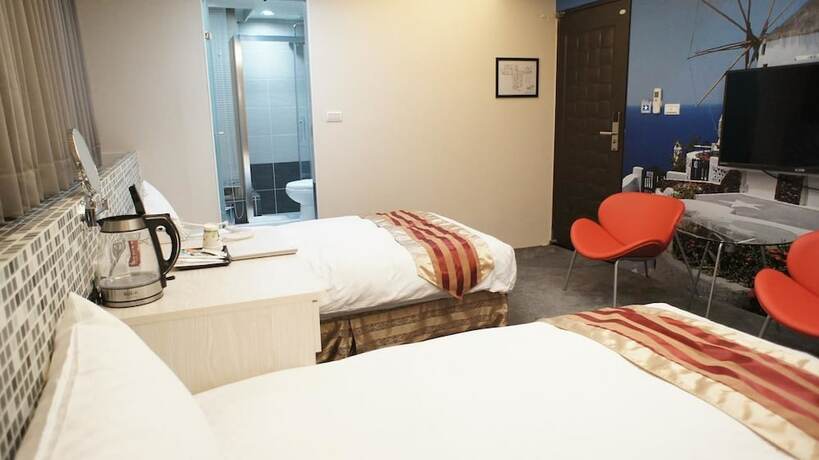 Imagen de la habitación del Hotel Shun-yi. Foto 13