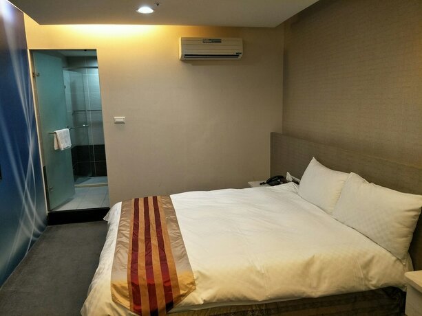 Imagen de la habitación del Hotel Shun-yi. Foto 15