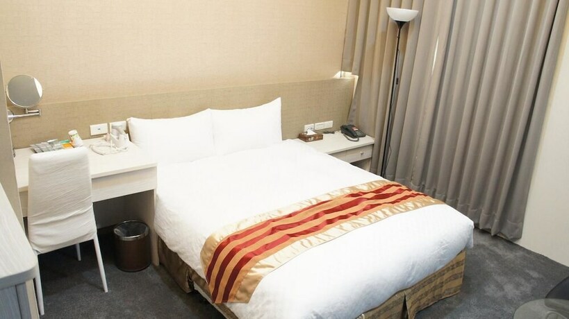 Imagen de la habitación del Hotel Shun-yi. Foto 18
