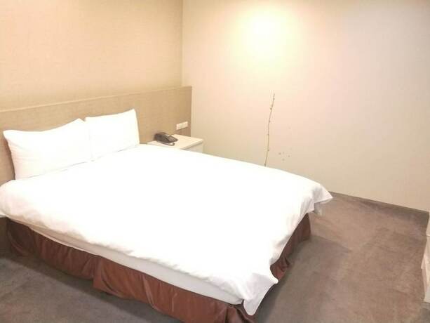Imagen de la habitación del Hotel Shun-yi. Foto 19