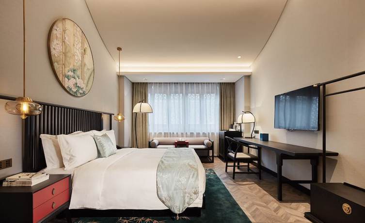 Imagen de la habitación del Hotel Shuxiang Wenru. Foto 11