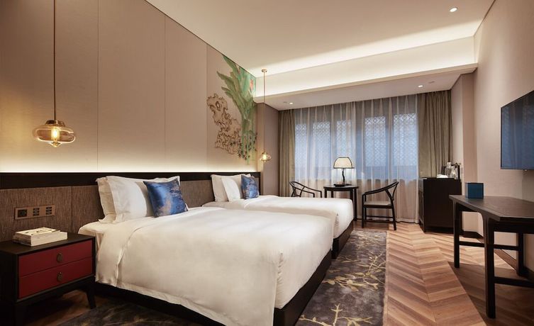 Imagen de la habitación del Hotel Shuxiang Wenru. Foto 12
