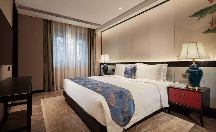 Imagen de la habitación del Hotel Shuxiang Wenru. Foto 14