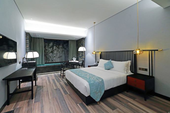 Imagen de la habitación del Hotel Shuxiang Wenru. Foto 15