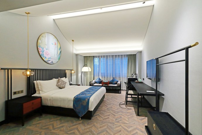Imagen de la habitación del Hotel Shuxiang Wenru. Foto 18