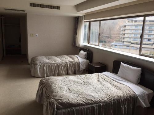 Imagen de la habitación del Hotel Shuzenji Onsen Takitei. Foto 8