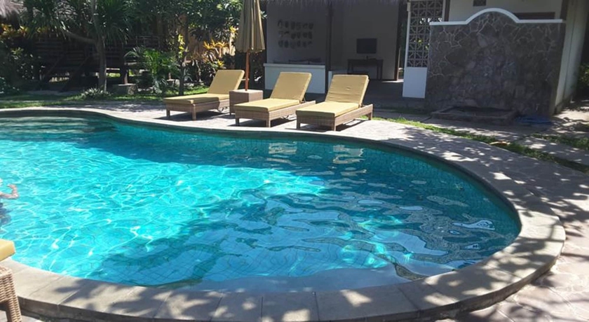 Imagen de la piscina del Hotel Si Pitung Village. Foto 17