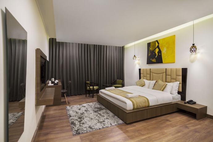 Imagen de la habitación del Hotel Sia Residency. Foto 5