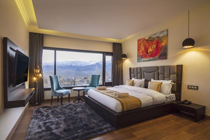 Imagen de la habitación del Hotel Sia Residency. Foto 9