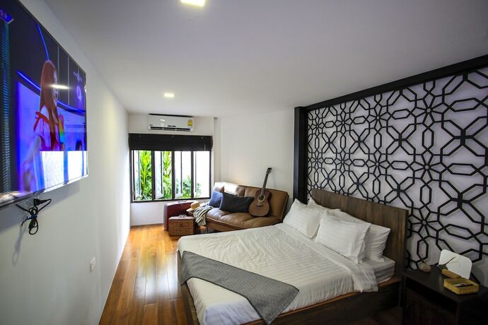 Imagen de la habitación del Hotel Siam Nitra Boutique. Foto 27