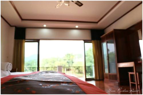 Imagen de la habitación del Hotel Siam Pavilion Resort. Foto 13