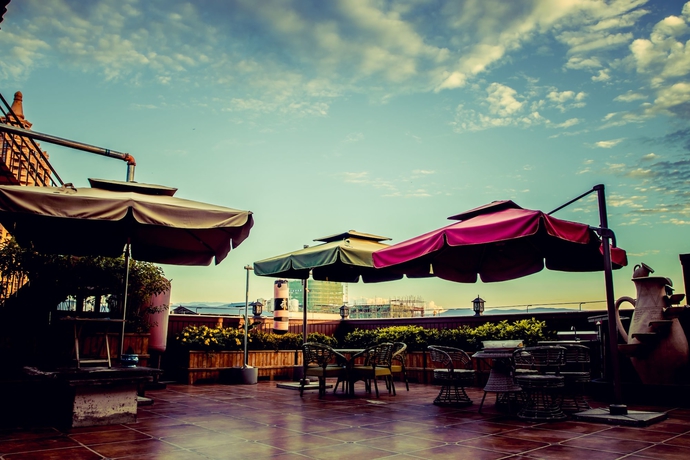 Imagen de los exteriores del Hotel Siam Xishuangbanna. Foto 12