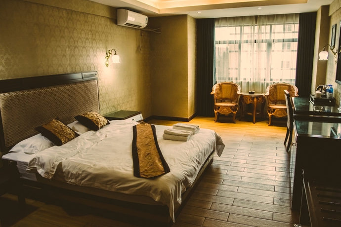 Imagen de la habitación del Hotel Siam Xishuangbanna. Foto 9