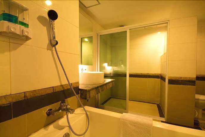 Imagen de la habitación del Hotel Siamthana Hotel. Foto 11