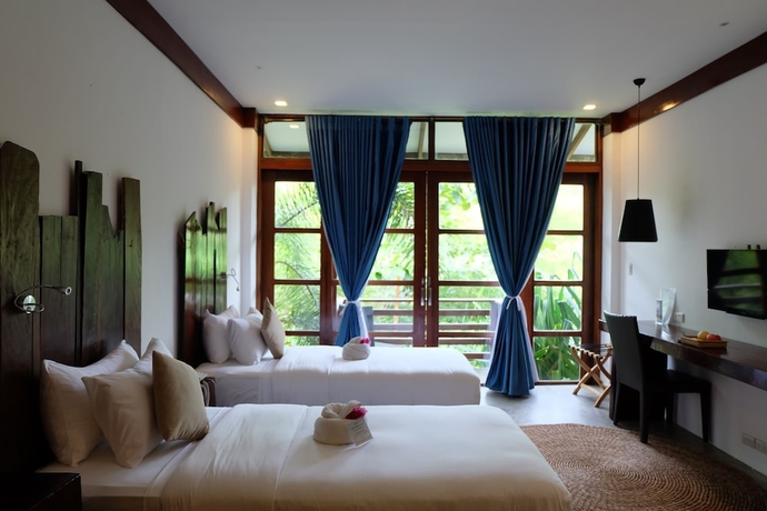 Imagen de la habitación del Hotel Siargao Bleu Resort and Spa. Foto 8