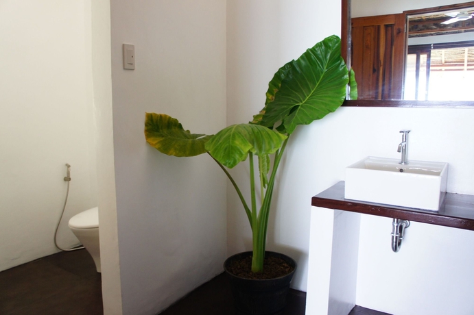 Imagen de la habitación del Hotel Siargao Inn Beach Resort. Foto 8