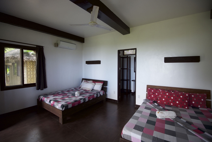 Imagen de la habitación del Hotel Siargao Inn Beach Resort. Foto 13