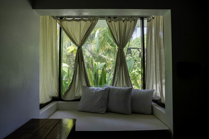 Imagen de la habitación del Hotel Siargao Island Villas. Foto 18