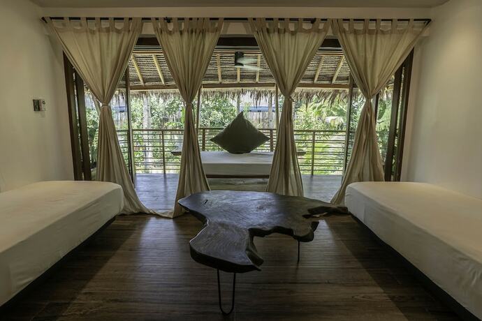 Imagen de la habitación del Hotel Siargao Island Villas. Foto 24