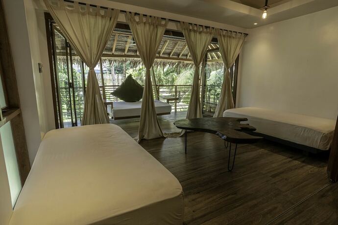 Imagen de la habitación del Hotel Siargao Island Villas. Foto 29