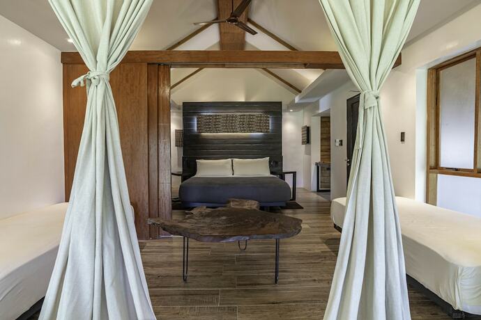 Imagen de la habitación del Hotel Siargao Island Villas. Foto 32