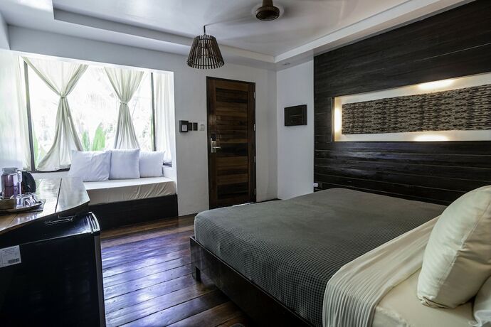 Imagen de la habitación del Hotel Siargao Island Villas. Foto 33