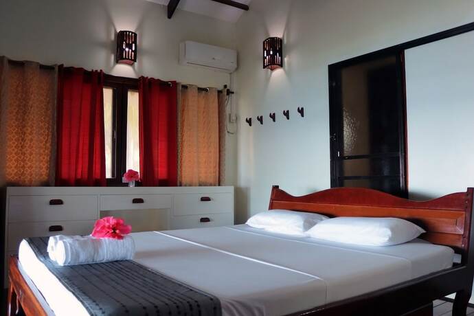 Imagen de la habitación del Hotel Siargao Sunrise Villa. Foto 2