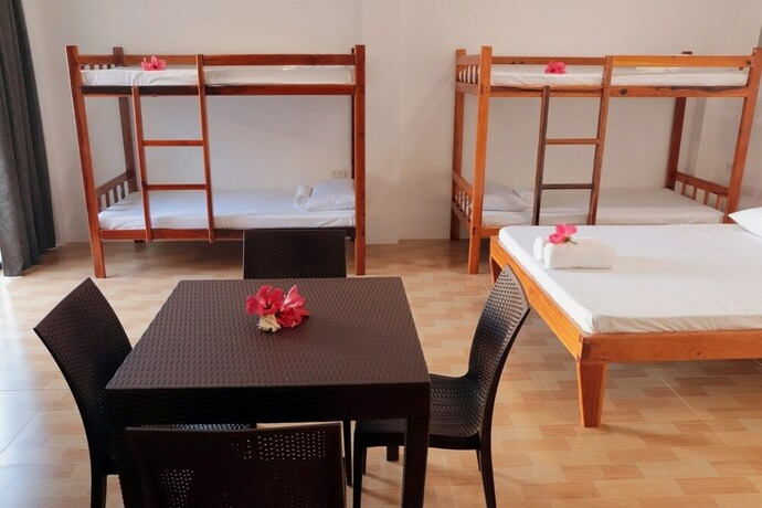 Imagen de la habitación del Hotel Siargao Sunrise Villa. Foto 4