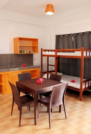 Imagen de la habitación del Hotel Siargao Sunrise Villa. Foto 7