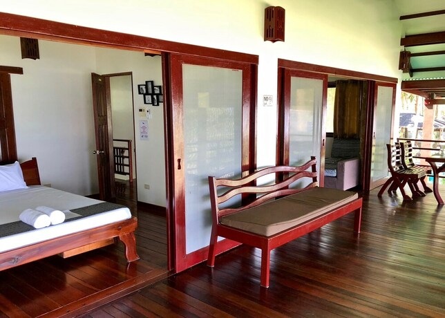 Imagen de la habitación del Hotel Siargao Sunrise Villa. Foto 12
