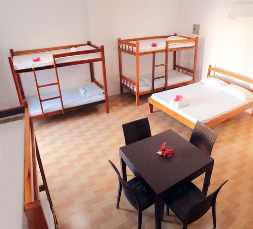 Imagen de la habitación del Hotel Siargao Sunrise Villa. Foto 14