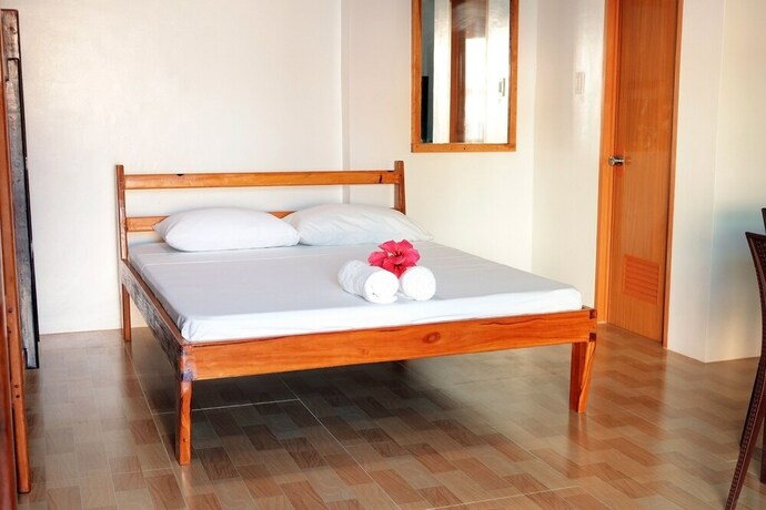 Imagen de la habitación del Hotel Siargao Sunrise Villa. Foto 15