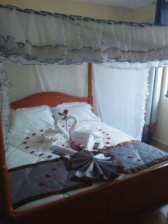 Imagen de la habitación del Hotel Siaya Summit. Foto 8