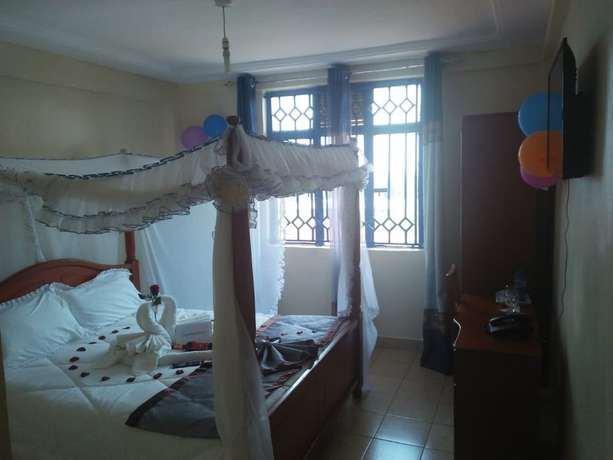 Imagen de la habitación del Hotel Siaya Summit. Foto 11