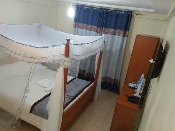 Imagen de la habitación del Hotel Siaya Summit. Foto 13
