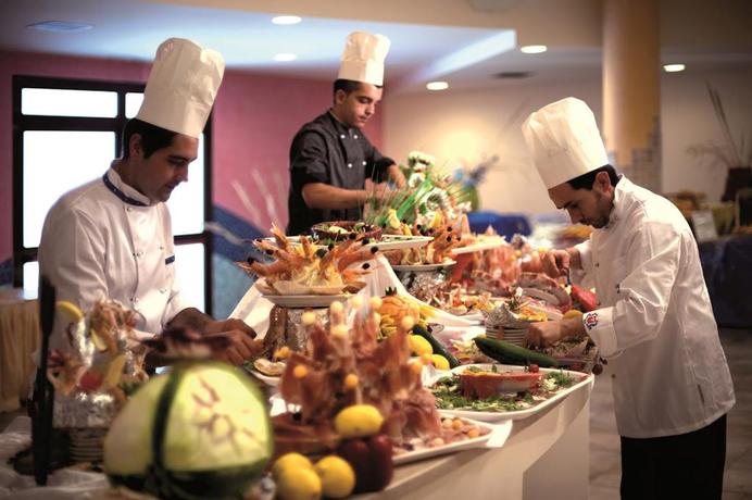 Imagen del bar/restaurante del Hotel Sibari Green Village. Foto 4