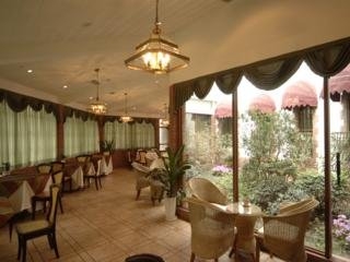 Imagen del bar/restaurante del Hotel Sichuan West Wing. Foto 2