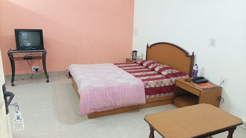 Imagen de la habitación del Hotel Siddharth, Dehradun. Foto 14