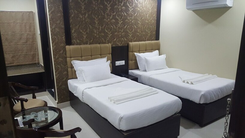 Imagen de la habitación del Hotel Siddharth. Foto 17