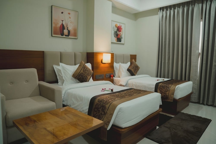 Imagen de la habitación del Hotel Siddharth Grand. Foto 4