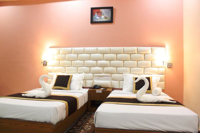 Imagen de la habitación del Hotel Siddhartha International. Foto 11