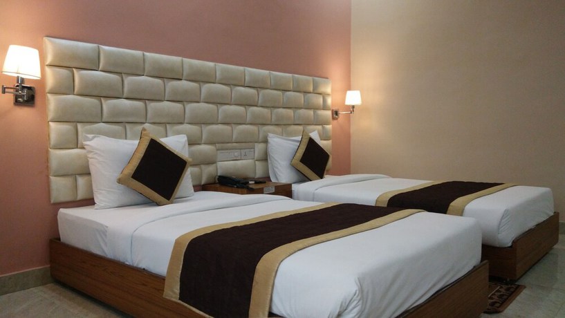 Imagen de la habitación del Hotel Siddhartha International. Foto 15