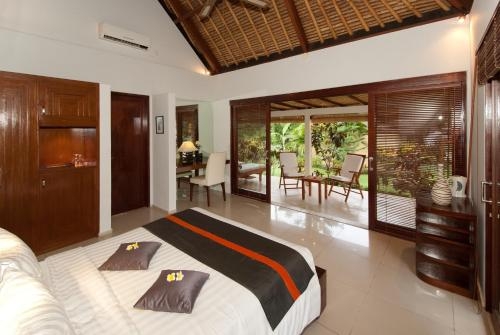 Imagen de la habitación del Hotel Siddhartha Ocean Front Resort & Spa. Foto 6