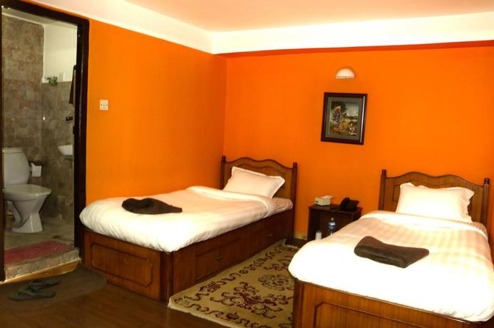 Imagen de la habitación del Hotel Siddhi Home and Restaurant. Foto 6