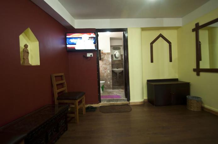 Imagen de la habitación del Hotel Siddhi Home and Restaurant. Foto 7